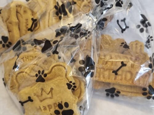 Handmade dog birthday treats in paw print gift bags for dog celebration UK