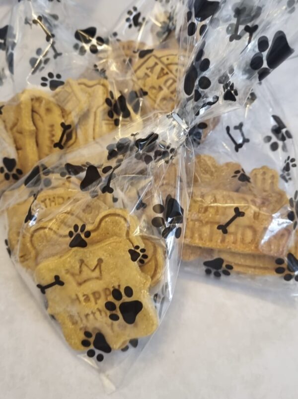 Handmade dog birthday treats in paw print gift bags for dog celebration UK