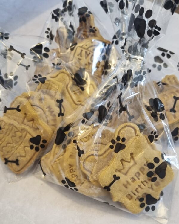 Vegan dog treats packaged for dog celebration UK in paw print cellophane